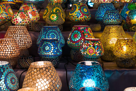 Vibrant turkish mosaic lamps, crafted from colorful glass pieces, displaying intricate geometric and...