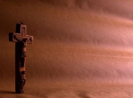 little and old wood cross, with carved images of Jesus and the Virgin Mary の写真素材