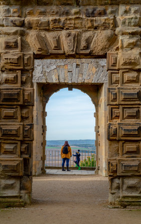 BOLSOVER, UK - 7TH OCTOBER 2018: A mother and her son looking at the view from Bolsover Castle