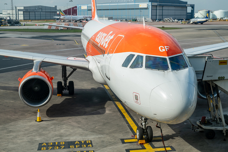 MANCHESTER, UK - 9TH APRIL 2019: Close up of a Easyjet Airbus plane ready for passengers at Manchester Airport - Daylight 2019のeditorial素材