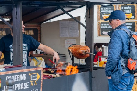 PRAGUE, CZECHIA - 10TH APRIL 2019: Tourists and locals gather around the Prague Old Square to visit the stalls from the Easter Market - A famous Czech traditionのeditorial素材