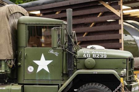 DONCASTER, UK - 28TH JULY 2019: A close up of a green and brown M35 army cargo truck used during...