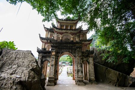 Beautiful Bich Dong Pagoda entrance in Tam Coc, Ninh Binh, Northern Vietnam shot in October 2019 on a bright dayの写真素材