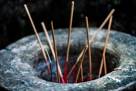 Incense sticks for prayer at Bich Dong Pagoda - A buddist temple in Ninh Binh, Northern Vietnamの写真素材