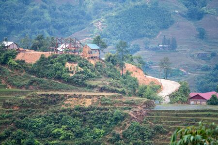Beautiful shot of Sapa and the surrounding mountains in North Vietnam during a overcast day in Autumn 2019の写真素材