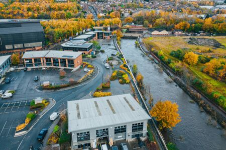 Aerial image of damage caused to offices by River Don, Sheffield, Yorkshire, UKのeditorial素材