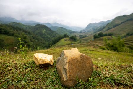 Beautiful shot of Sapa and the surrounding mountains in North Vietnam during a overcast day in Autumn 2019の写真素材