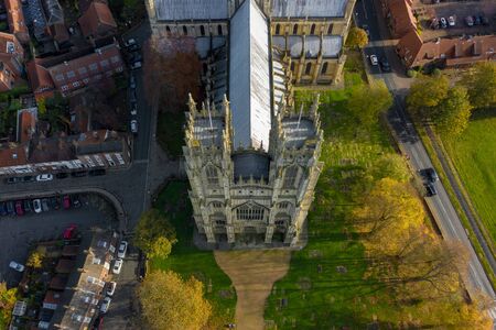 Overhead aerial top down view of Beverley Minster, the large gothic church in the centre of the small market town in East Yorkshire, UK. Shot in Autumn 2019の写真素材