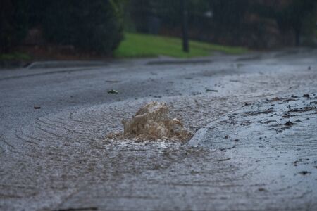 Roads flooded from water backing up during heavy rainfall in Storm Ciara, February 2020の写真素材