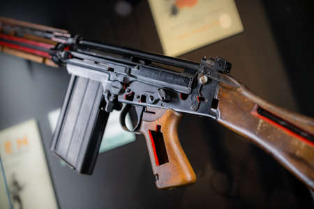 Close up of 7.62mm rifle. Black coloured, broken apart with the parts exposedの写真素材