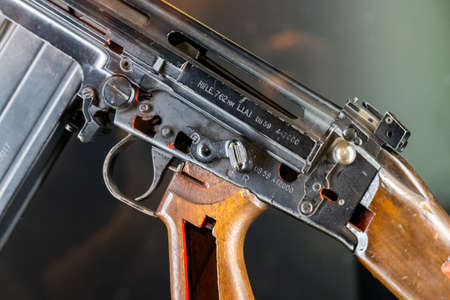 Close up of 7.62mm rifle. Black coloured, broken apart with the parts exposedの写真素材