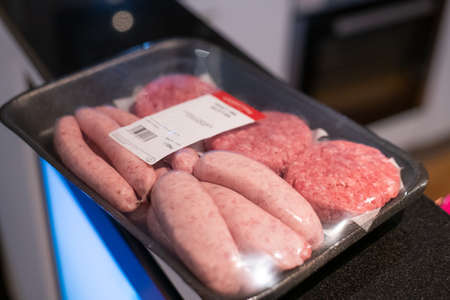 Package of meat for use on a BBQ with sausages and burgersの写真素材