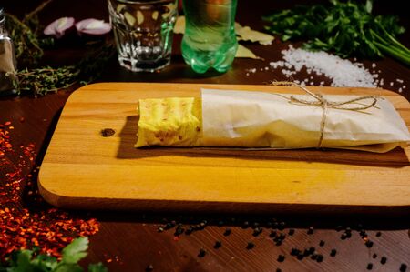 Doner Kebab Gyros Shawarma beef roll in pitta bread Wrap sandwich on wooden background.Shawarma chicken roll in a pita with fresh vegetables and cream sauce on wooden background.の写真素材