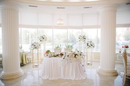 Festive and solemn decoration of the banquet room on the wedding dayの写真素材