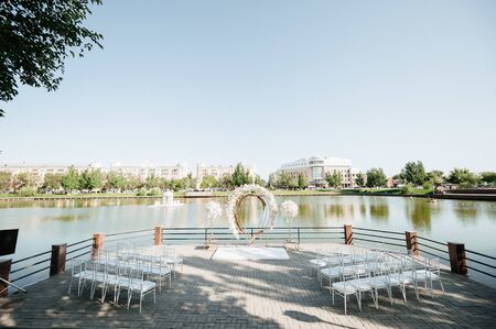Wedding. Wedding ceremony. Arch. Arch, decorated with pink and white flowers. wedding ceremony areaの写真素材