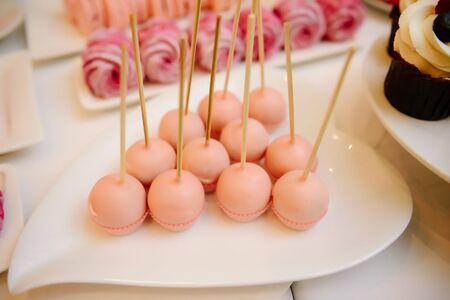 Sweet dessert table at a wedding.Cakestand at a wedding dayの写真素材