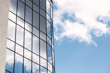 modern high-rise building with mirrored walls