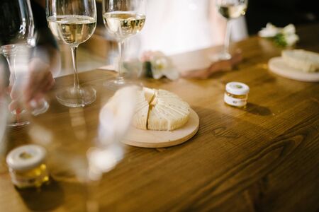 Man pours champagne into a glassの写真素材