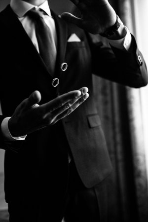 Groom throws up wedding rings.
