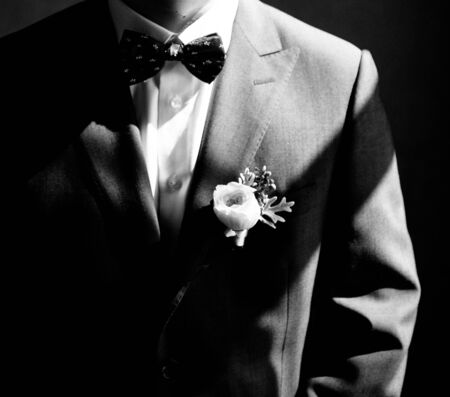 Man putting on a suit close upの写真素材