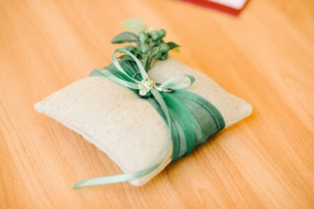 Wedding rings lie on a cushion for wedding rings.の写真素材