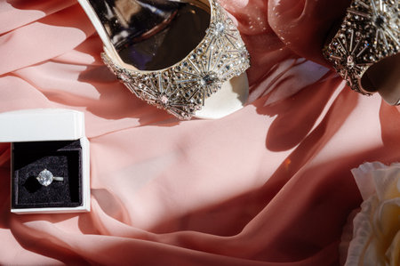 Women's accessories bride. Handbag, shoes, rings, bridal perfume close upの写真素材