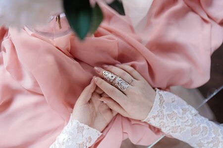 Young woman posing in a white wedding dressの写真素材