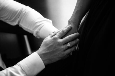 Man and woman hold handsの写真素材