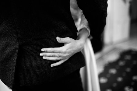 Man and woman hold hands close up. Hands of man and woman close up.