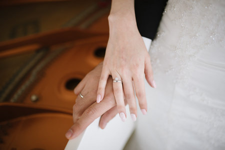 Man and woman hold hands