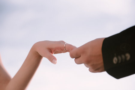 Man and woman hold hands close up. Hands of man and woman close up.