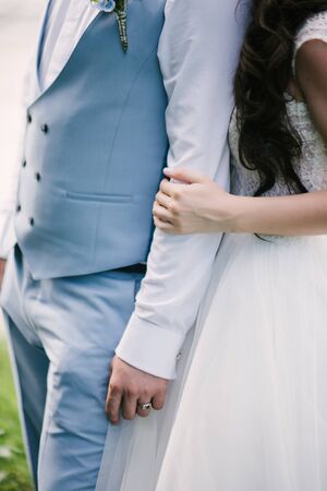 Man and woman hold hands close up. Hands of man and woman close up.の写真素材