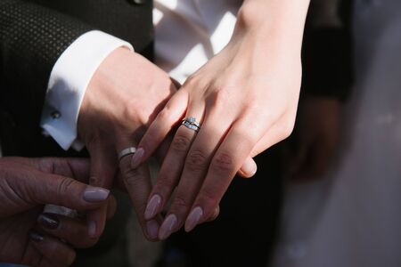 Man and woman hold handsの写真素材