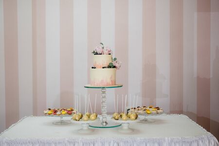 Big wedding cake close-up on the wedding tableの写真素材