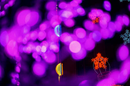 Bright Christmas decorations on urban trees. Decoration of the city.Blurred bokeh basic background for designの写真素材