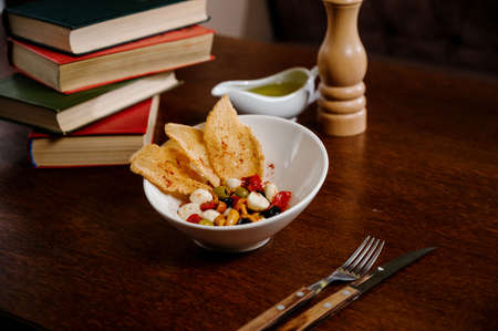 appetizer with pickled mushrooms, olives, parmesan on wooden backgroundの写真素材