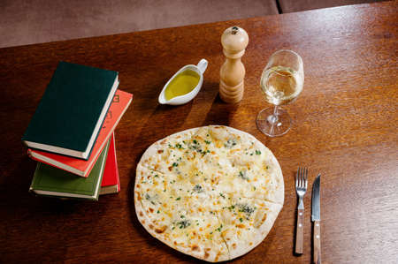 Flatbread with greens and herbs. Traditional caucasus and Turkish bread. Asian flatbreads with cheese and herbs.Khychiny - traditional caucasian flatbread filled with cheese and herbs.の写真素材
