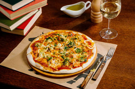 Delicious Shrimp pizza on wood table.Pizza with shrimp, salmon Top viewの写真素材