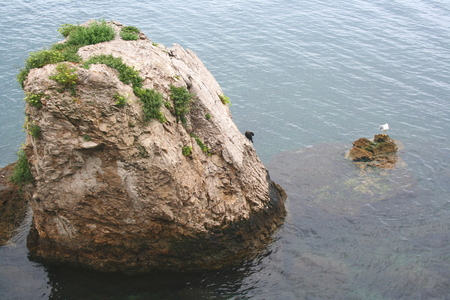 Encompass rock by the sea near Trieste, Italyの写真素材