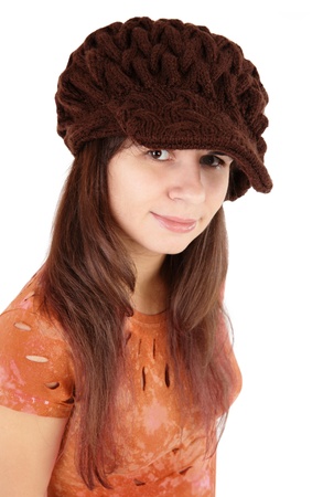 Girl in a cap on a white backgroundの写真素材