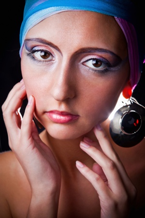 Fashion portrait of sensual woman in fashionable turbanの写真素材