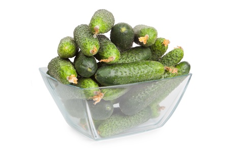 Healthy food. The green cucumbers isolated on white backgroundの写真素材