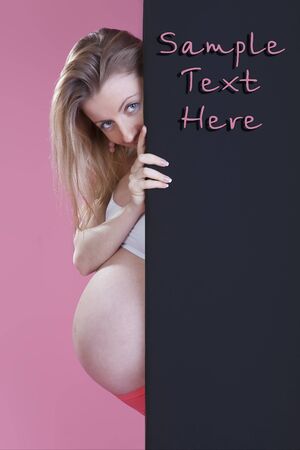 pregnant woman in studioの写真素材