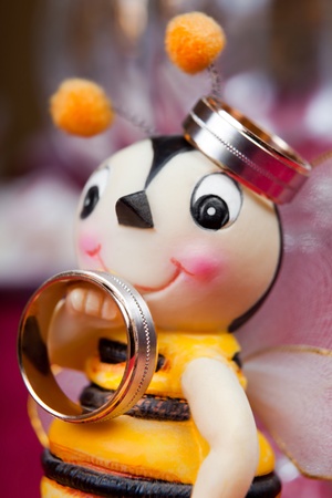 Wedding rings on a beeの写真素材