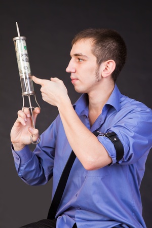Anti-recessionary injection  vaccination  by one dollar denominationの写真素材