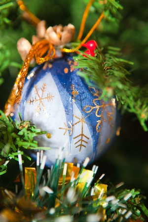 Christmas ball on the tree on blueの写真素材