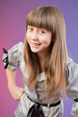 Portrait of beautiful young girl in studioの写真素材