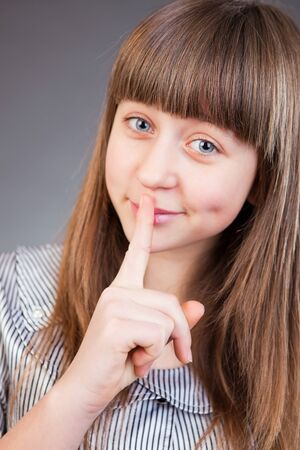 Portrait of beautiful young girl in studioの写真素材