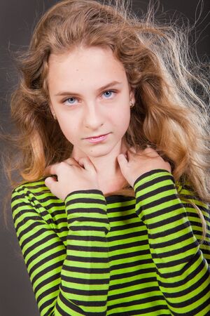 Portrait of beautiful young girl in studioの写真素材