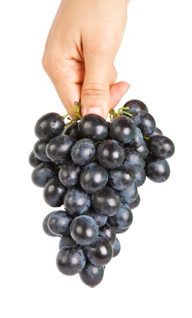 Grapes in a female handの写真素材